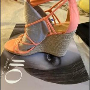 The brand is JLO  and they are a size and they are a coral color!